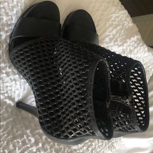 Juicy Couture Black leather High heeled Bootie.